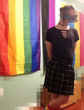 The assailant standing in front of multiple LGBT flags